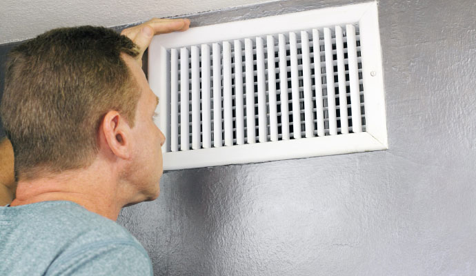 cleaning air duct vent with equipment
