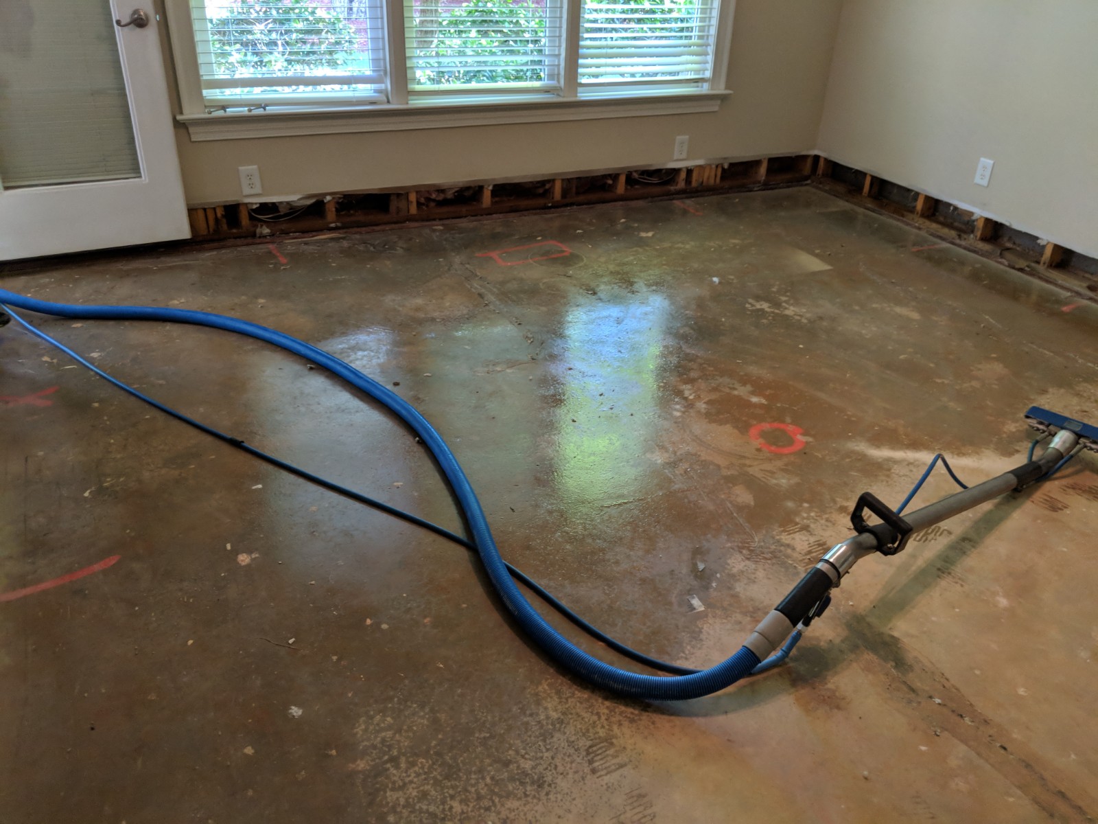 Removal of affected contents and beginning of drying process for water damage remediation