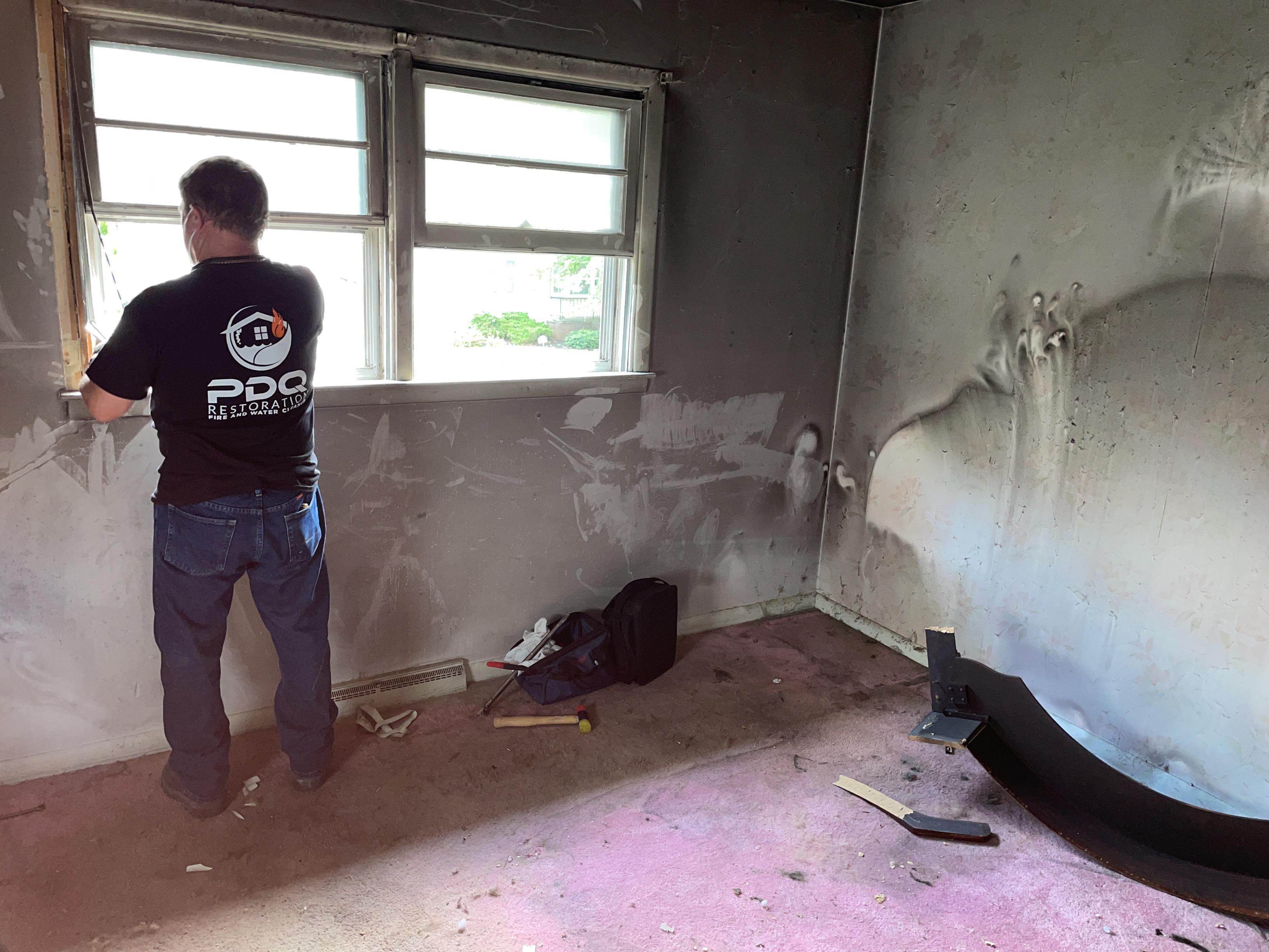 bedroom being cleaned up that was impacted by fire and soot build-up