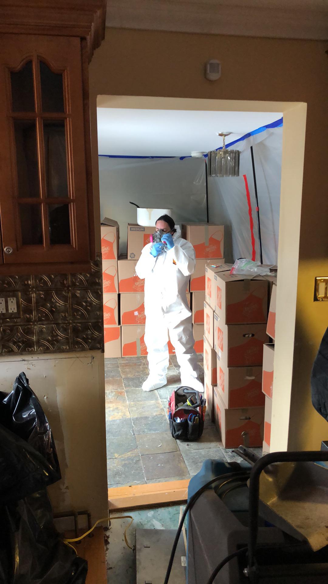 Suiting up for mold removal