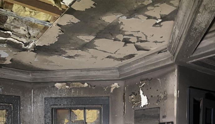soot insulation and smoke ceiling damage