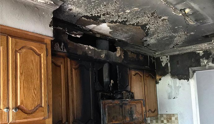 wall cabinet kitchen roof fire smoke damage